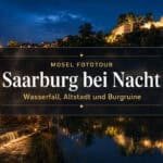 Saarburg bei Nacht mit Wasserfall und Burgruine
